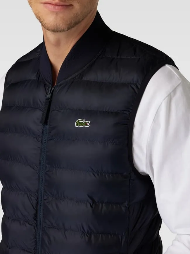 Lacoste quilted vest with attached labels, navy blue